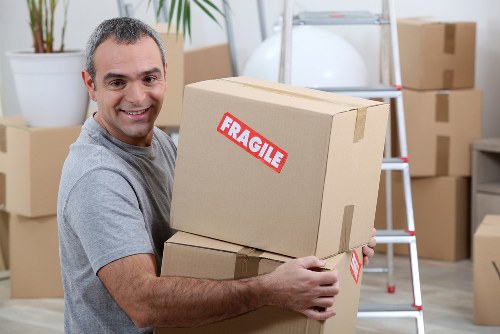 Removal van parked near a Holborn residential street during a flat move