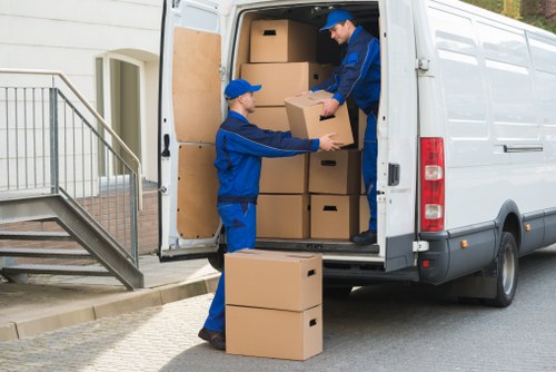 Professional team removing office furniture in Holborn