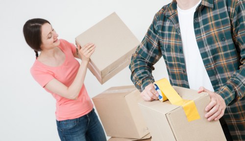 Packing boxes and furniture for a Holborn home move