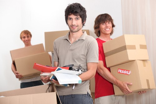 Flat removal team loading items carefully for a Holborn relocation