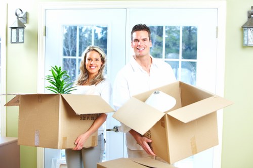 Organized moving day with packed boxes and furniture in Holborn