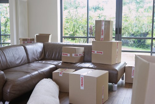 Movers organizing boxes and packing materials for a Holborn relocation