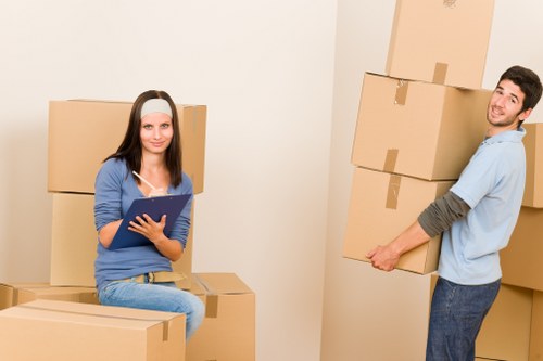 Packed moving boxes ready for removal truck hire in Holborn