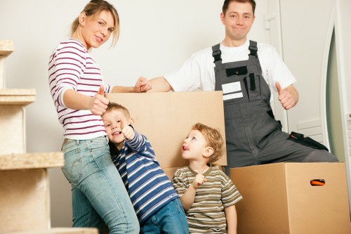 Professional movers loading items during a central London relocation